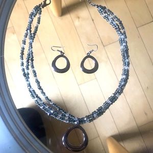 Beaded silver, grey, clear necklace with pewter color earring.